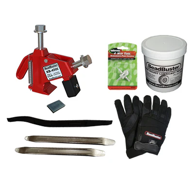 XB-450i Deluxe Kit with tire irons, lube, gloves, valve core tool, and spacer